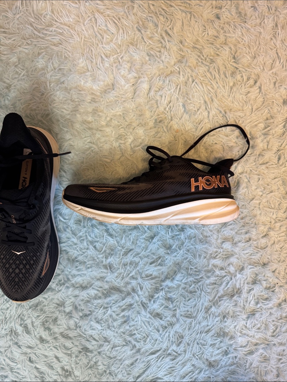 Hoka Men's Clifton Black Running Shoes with Copper Accents and Cream Midsole 9.5